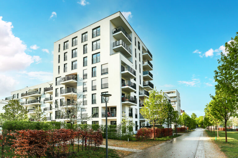 Cityscape of a residential area with modern apartment buildings, new green urban landscape in the city